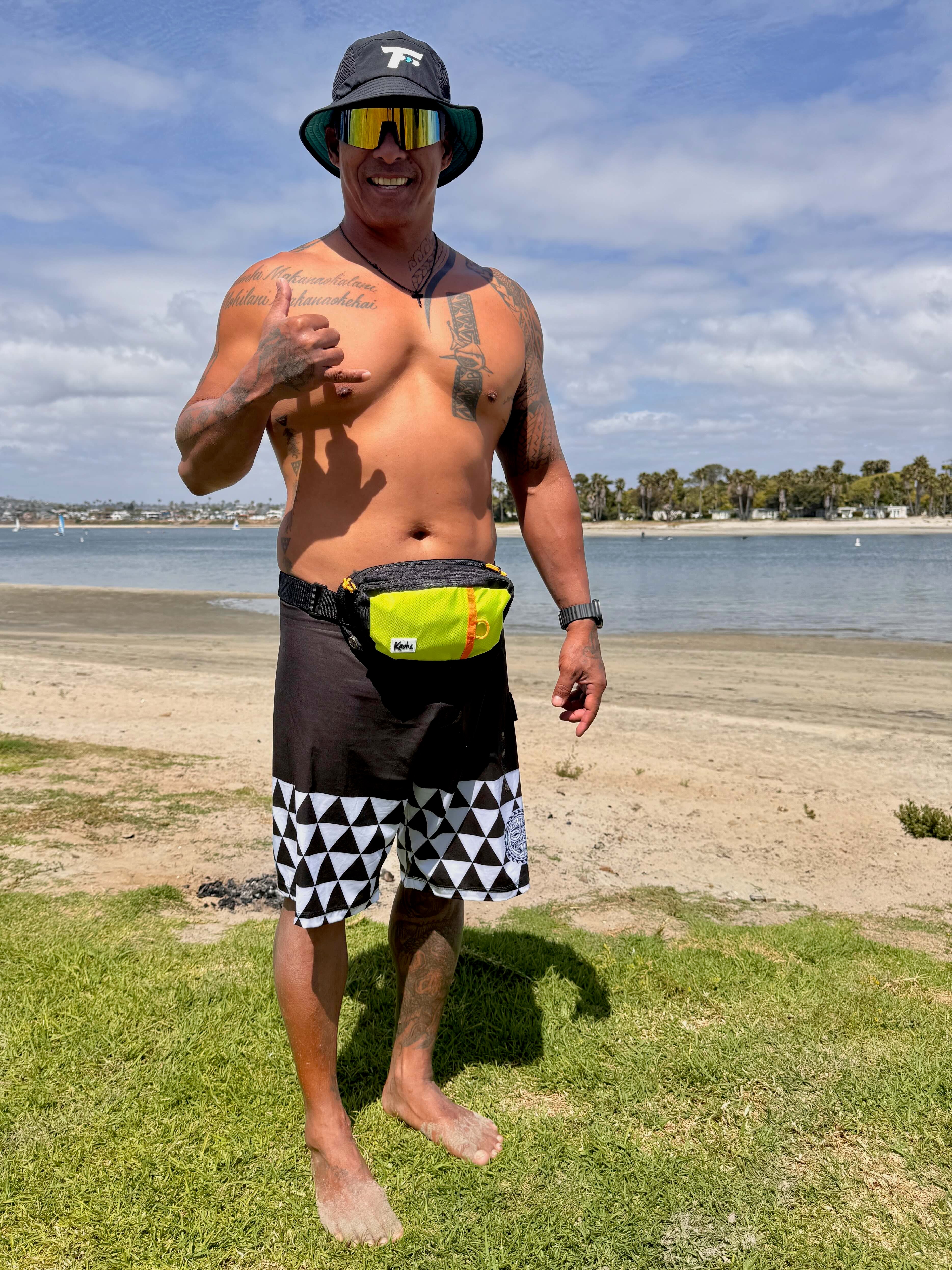 Downwind foiling pouch waist bag safety butt bag pack K-Pack Kaohi SUP foil hydrofoil foil assist down winding leash harness High viz travel bag Hawaiian Watersports