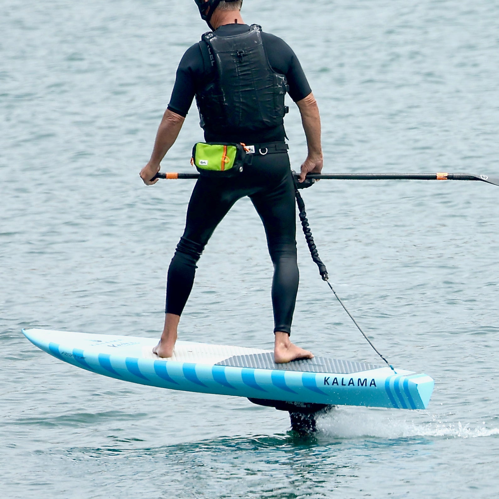 Downwind foiling pouch waist bag safety butt bag pack K-Pack Kaohi SUP foil hydrofoil foil assist down winding leash harness High viz travel bag Hawaiian Watersports